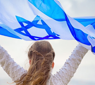 Girl waving Israel flag