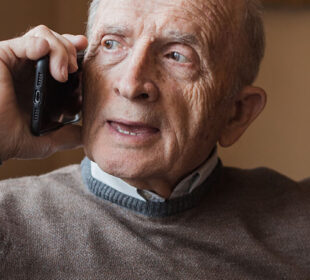 Older man talking on the phone