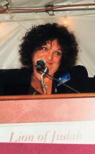 Laura Black speaking at a Lion of Judah event